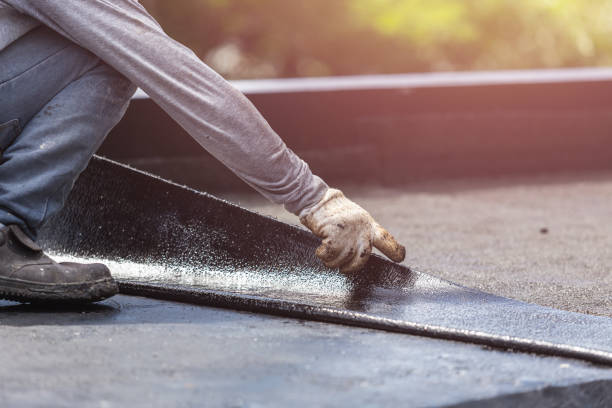 Professional Waterproofing technician working in Baldwinsville, NY